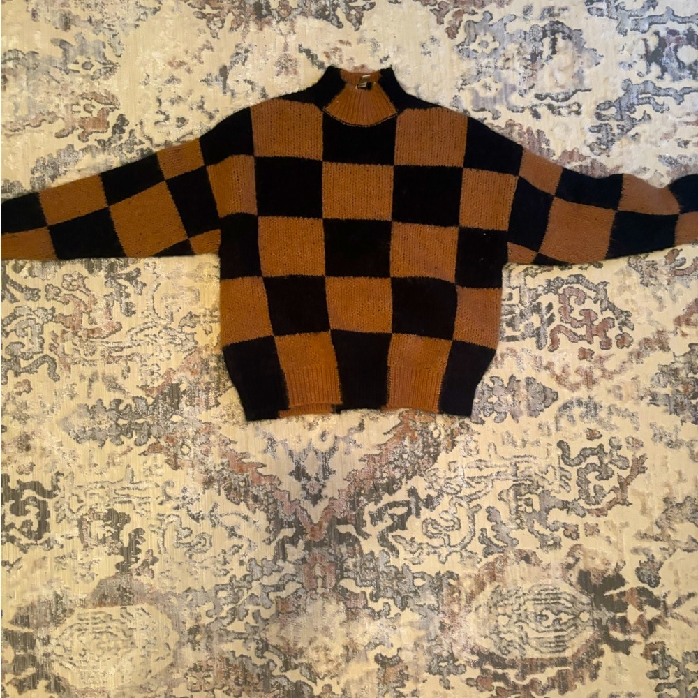 Brown and black checkered sweater